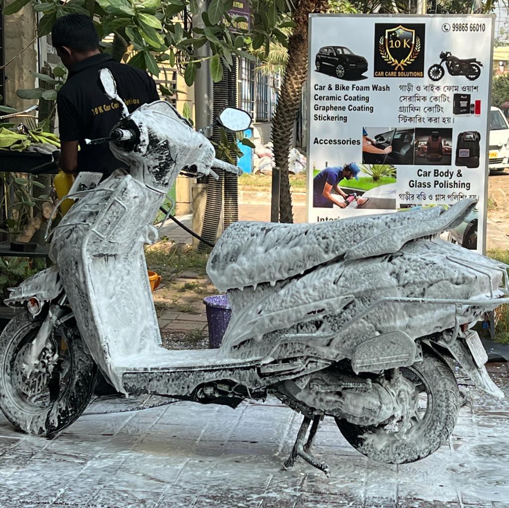 Washing Scooters and Motorcycles with Foam for removing tar and grime. 
